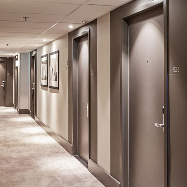 Porte de chambre d'hôtel en bois insonorisée pour les suites de chambres d'hôtes
