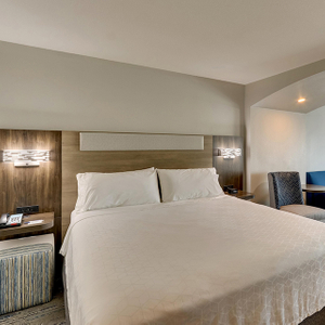 Très grand lit plateforme rembourré de style DoubleTree