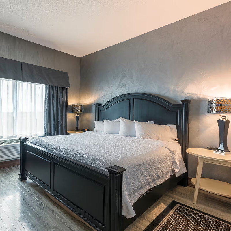 Lit d'hôtel à plate-forme simple avec tête de lit rembourrée