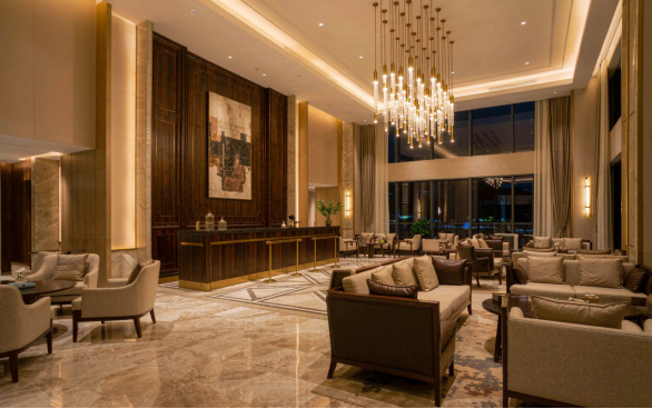 Lobby 120 m&sup2; : comptoir, salons et &eacute;clairage