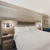 Très grand lit plateforme rembourré de style DoubleTree