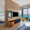 Meuble TV d'hôtel à étagère ouverte avec minibar